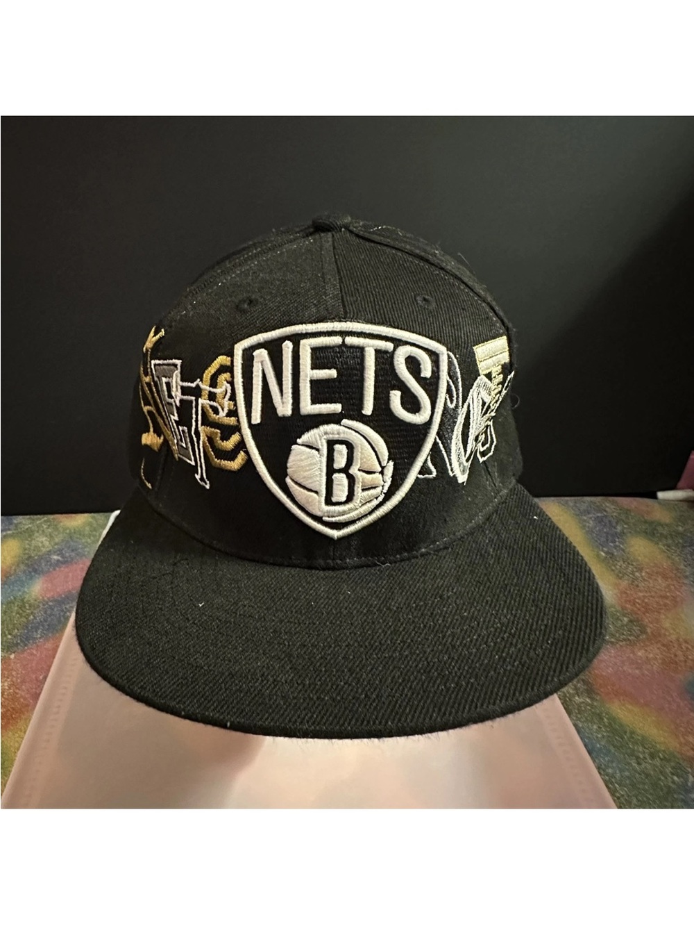 Mitchell & Ness Black and Gold Interior Logo Snapback